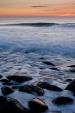 dawn, first light, rising, tide, swell, boulders, rocky, beach, wave, waves, clouds, northumberland, england