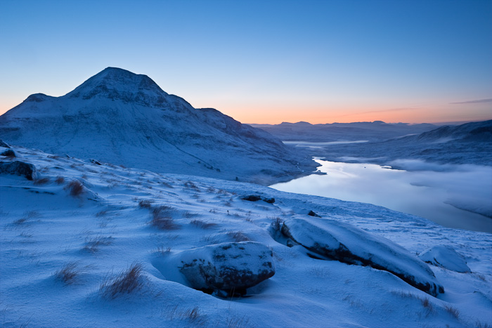 Thick snow on the lower slopes had hampered my efforts to be in position for dawn. As a result, I was rushing about trying to...