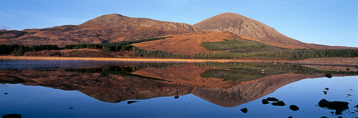 An unusually still morning created this perfect reflection on Loch Cill Chriosd on Skye. The mountains in this Autumn panorama...